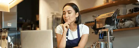 Small business owner planning Bluesky content