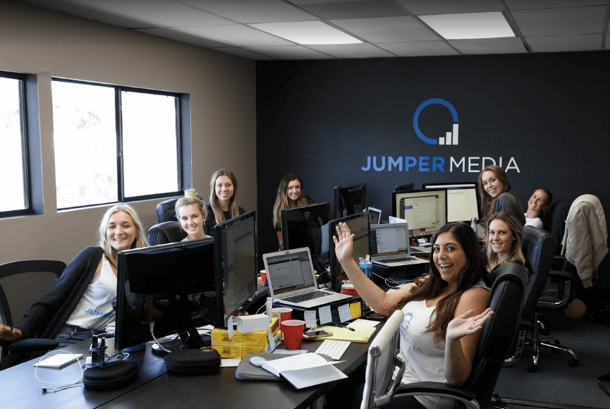 some of the team at jumper media in their office headquarters in san diego - instagram marketing agency instagram service jumper media