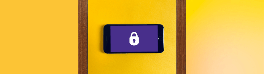 Mobile phone with the a white padlock on a purple background